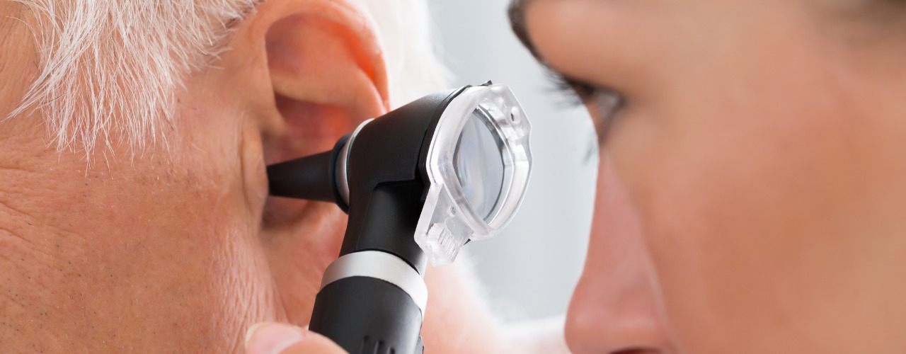 attachment-female-doctor-examining-patients-ear-picture-id845307818