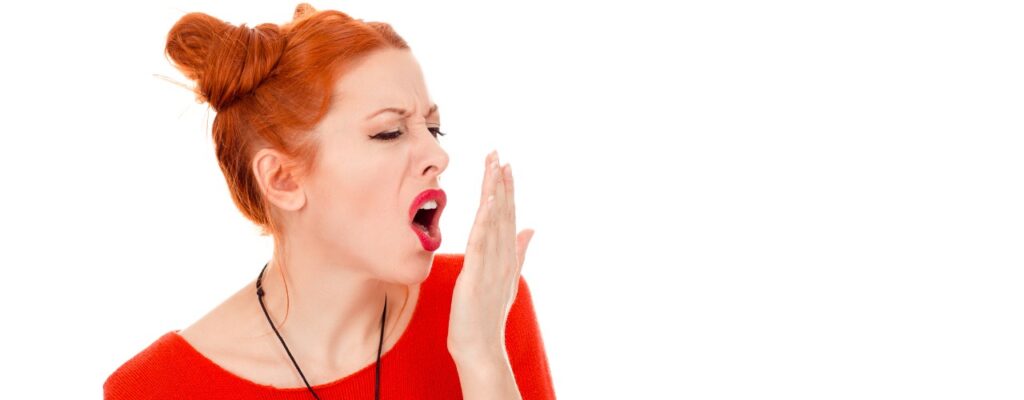 attachment-beautiful-girl-doing-a-hand-breath-test-woman-in-her-30s-checking-picture-id1159028227