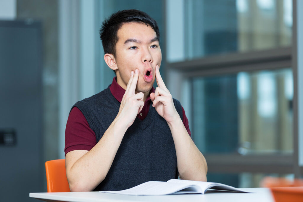 young-teenage-boy-engaged-in-oral-motor-exercises