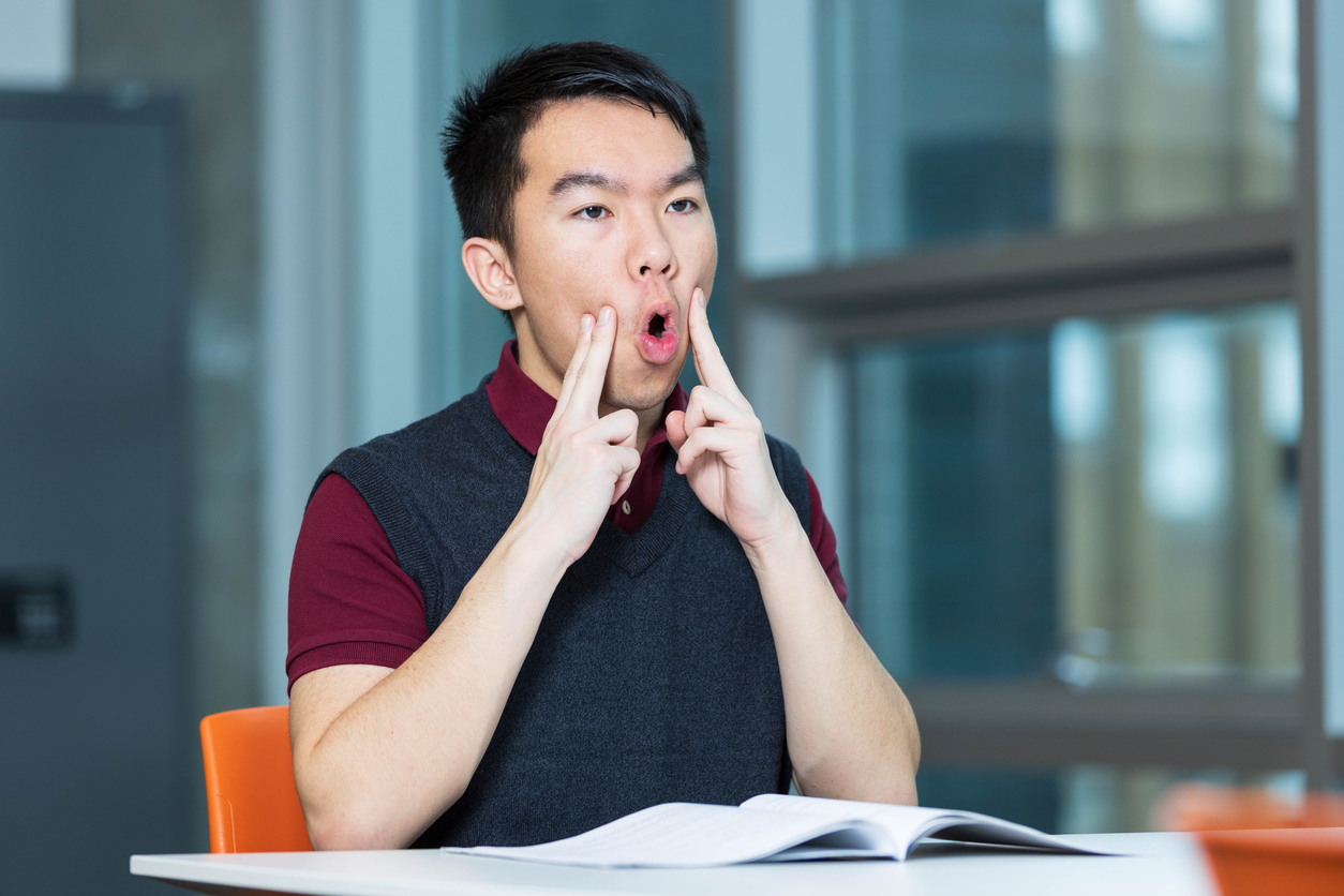 young-teenage-boy-engaged-in-oral-motor-exercises